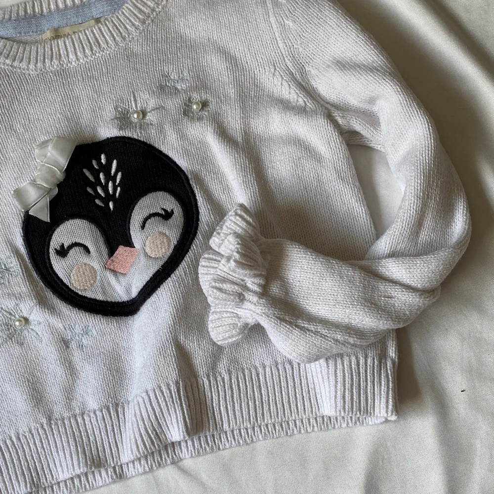 Adorable White Kids Sweater with Penguin Design